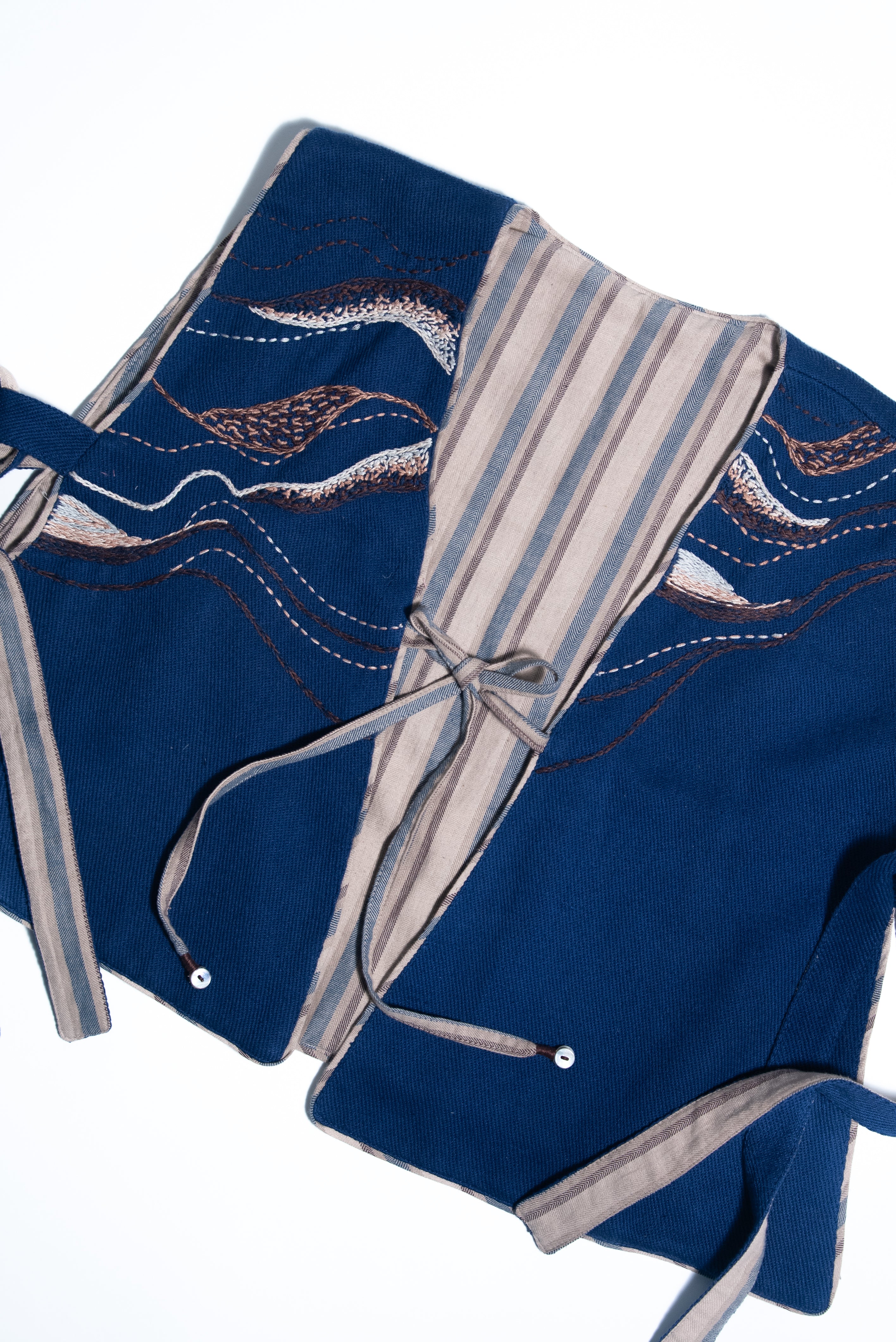Unquiet Reversible Bib-Mineral Blue