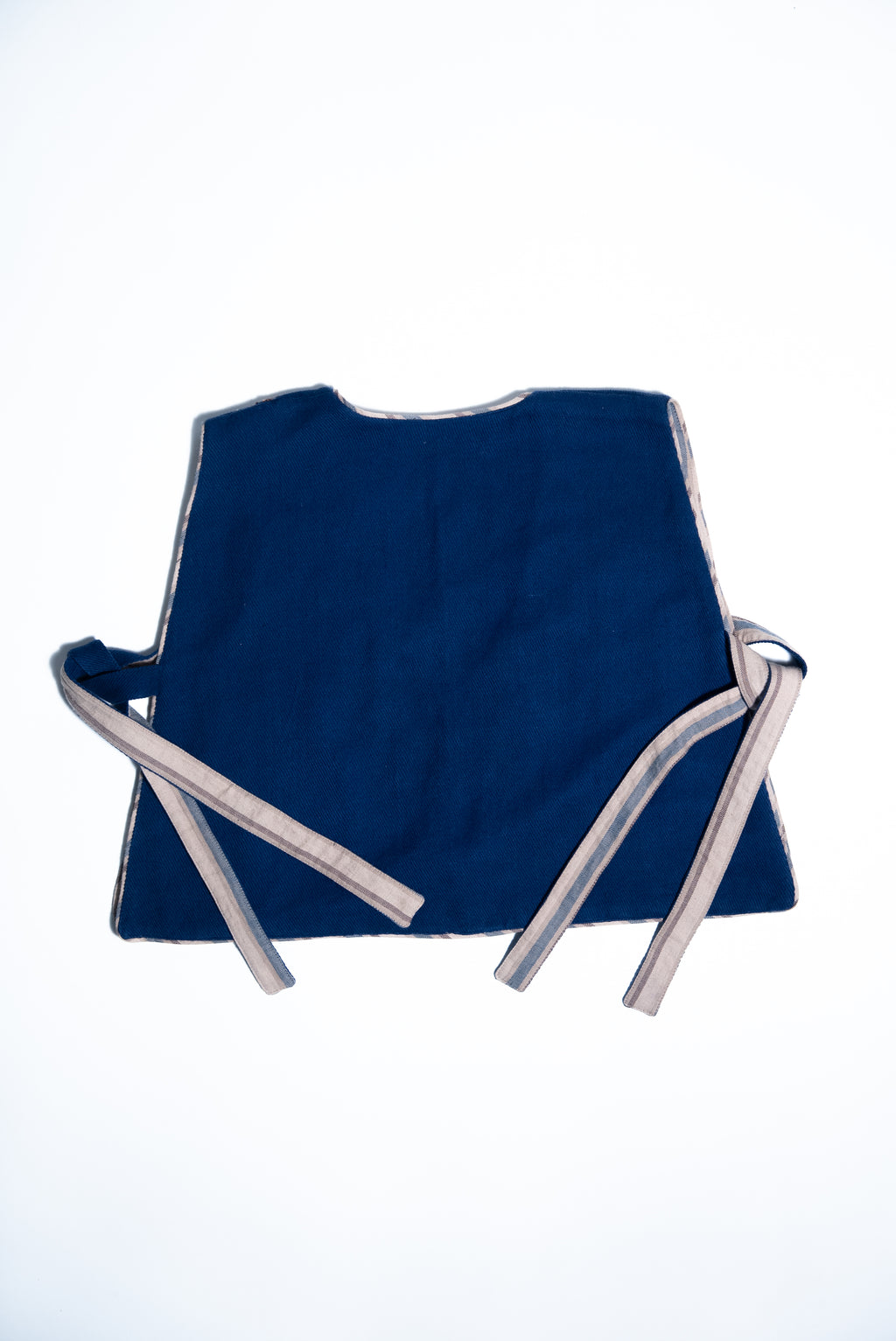 Unquiet Reversible Bib-Mineral Blue